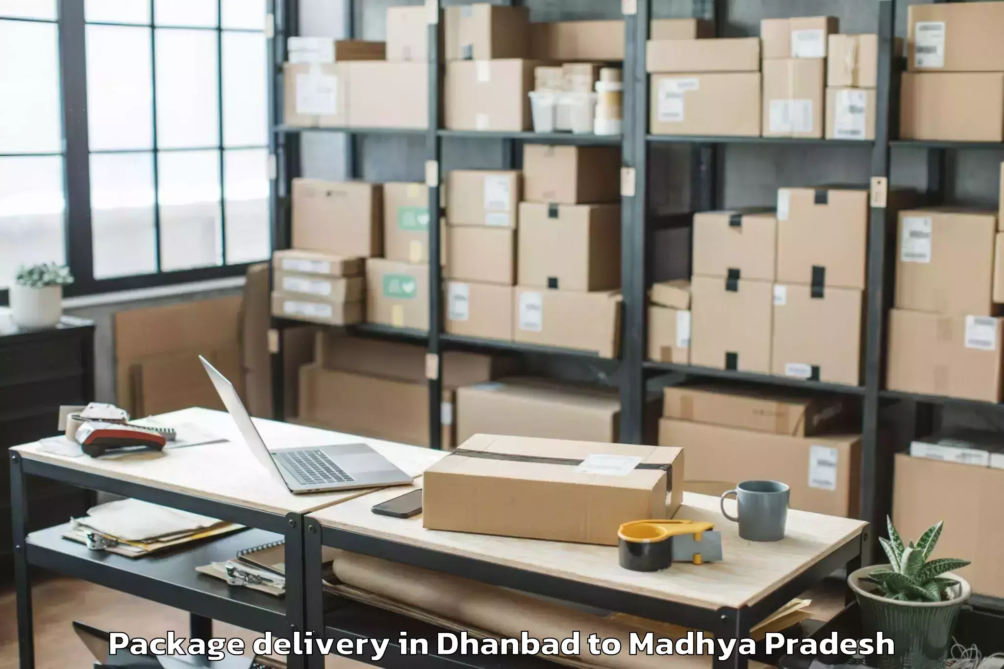 Book Dhanbad to Barnagar Pt Package Delivery Online